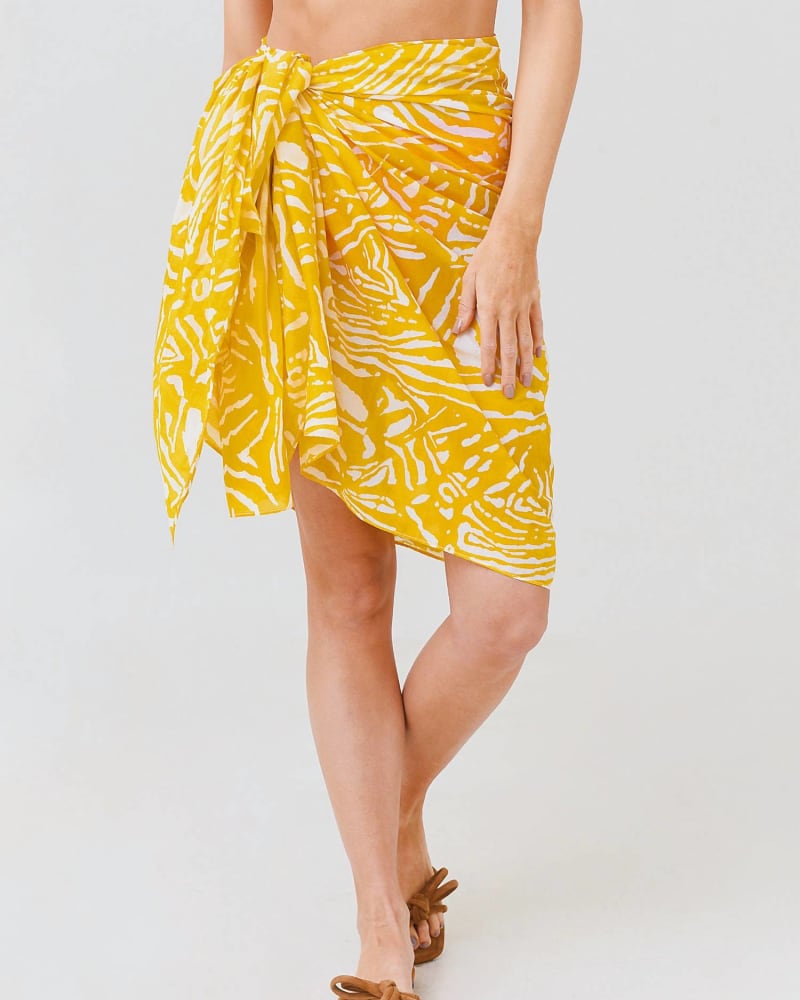 Front of a model wearing a size O/S Printed Sarong In Marigold Palms in Marigold Palms by HUNTER BELL. | dia_product_style_image_id:357488